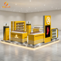 Vitrine de présentation de cosmétiques de luxe et présentoirs haut de gamme pour parfums avec comptoir en verre trempé pour centre commercial