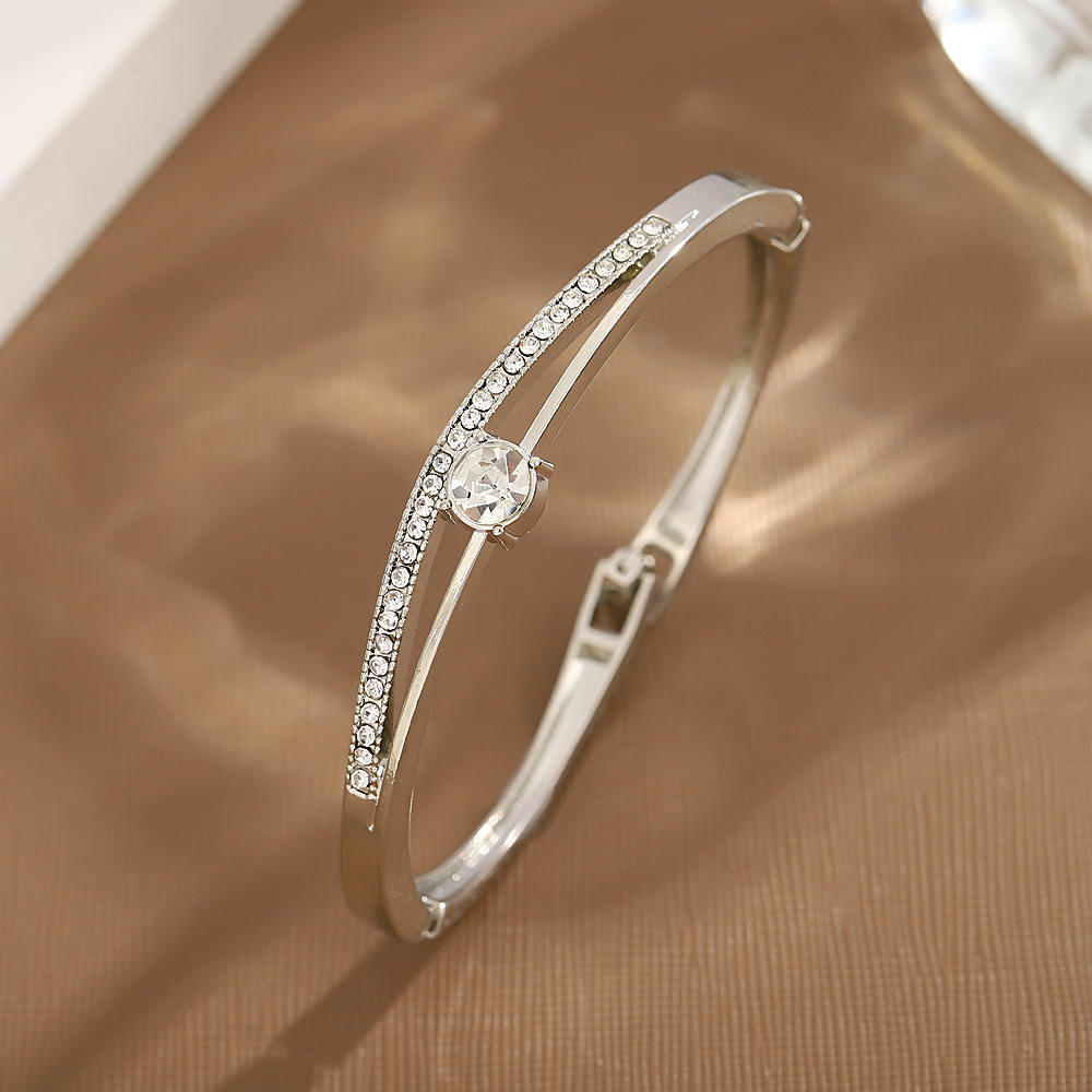 Brazalete de diamantes K blanco