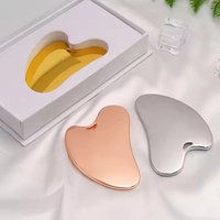 Outil de massage facial en acier inoxydable Gua Sha en forme de cœur pour le soin de la peau, lifting, décongestionnement, contouring de la mâchoire, outil de beauté anti-rides pour les yeux et le cou