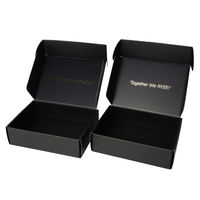 Boîte d'expédition en carton ondulé noir personnalisée avec logo et finition mate pour emballage e-commerce de luxe