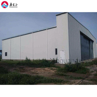 Offre Spéciale préfabriqué cadre en acier Construction Sandwich Bardage Entrepôt Garage Ateliers et usines