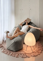 Chaise de salle à manger moderne en tissu en forme de larme, une place, avec fonction inclinable et coussin garni de billes pour un confort moelleux