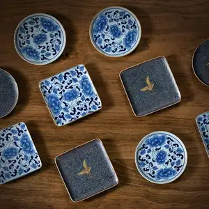 Jingdezhen de cerámica regalo de estilo japonés cerámica gruesa oro regalo de prueba de calor estera taza de té de cerámica de kung fu de la ceremonia del té