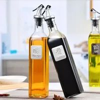 Meilleure vente 650ml 300ml haute qualité verre distributeur d'huile d'olive bouteille forme carrée liège étanchéité verre clair pour le stockage de l'huile
