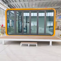Capsule spatiale modulaire préfabriquée à une chambre avec salon, cuisine et salle de bain
