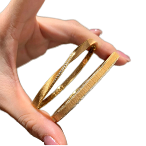 Bracelet empilable tendance Aoya pour femme, style boucher italien vintage, plaqué or, haut de gamme, torsadé Mobius brossé, avec zircon - Product Image 1