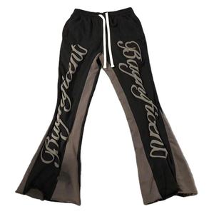 Pantalon de survêtement ample unisexe personnalisé en tissu éponge de coton avec cordon de serrage et impression en relief, idéal pour l'extérieur - Product Image 1