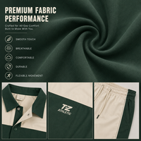 Ensemble de survêtement homme tendance 2026 : Veste et short de coach personnalisés en blocs de couleurs vert forêt et crème, directement de l'usine