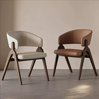 Chaise de salle à manger en cuir minimaliste nordique italienne, fauteuil avec dossier rembourré amovible pour hôtels et restaurants