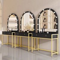 Table de Maquillage Moderne de Luxe en Métal Noir et Or avec Miroir LED Arqué et Hauteur Réglable pour Salon de Coiffure - Vente en Gros