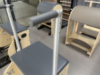 Chaise de Pilates en bois d'érable pour studio à domicile commercial, chaise Wunda avec système à ressorts