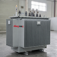 Transformateur de distribution triphasé immergé dans l'huile de 100 kVA, 10 kV/0,4 kV, compact, monté sur socle, pour zone résidentielle