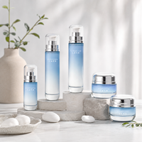 Bouteilles et pots en verre cylindriques transparents à bouchon arrondi avec couleurs de logo personnalisées pour emballages de soins de la peau, contenants en vrac de 30g, 50g, 40ml, 100ml, 120ml