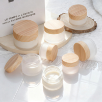 Bouteille cosmétique 5ml 10ml 20ml 30 ml 50ml 100ml 150ml 200ml Bouteille de crème en verre ronde vide avec couvercle étanche dans un pot de crème en bois
