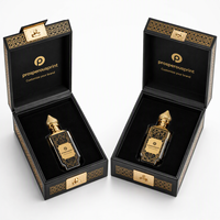 Boîte de parfum Attar noire et or de luxe avec découpe décorative, insert en velours, logo personnalisé, emballage cadeau à charnière