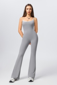 Tuta da yoga aderente e comoda con spalline incrociate, schiena scoperta e stampa a righe color block. - Product Image 1