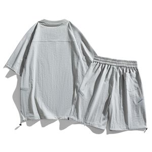 ชุดสูทแขนสั้นโลโก้สั่งทำพิเศษสำหรับผู้ชาย คอลเลคชั่นใหม่ปี 2025 เสื้อยืดลำลอง กางเกงวิ่งขายาวสองชิ้น ชุดลำลองผู้ชายยอดนิยม - Product Image 4