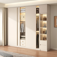 Garde-robe de luxe à portes coulissantes avec lumière Offre Spéciale et éclairage LED Accents en métal couleur crème meubles de chambre à coucher de placard