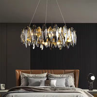 Lustre LED suspendu en acier inoxydable gris fumé de luxe, design circulaire multicouche en cristal, économe en énergie