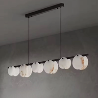 Lustre de restaurant en marbre et cuivre massif, design flocon de neige, luminaire linéaire créatif de luxe rectangulaire pour comptoir de bar