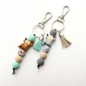Gantungan kunci sapi Highland Retro barat untuk hadiah pesta koboi gantungan kunci hewan dengan rumbai manik-manik silikon gantungan kunci tas pesona - Product Image 2