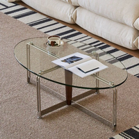 Table basse vintage en acier inoxydable durable, plateau en verre trempé ovale, design moderne minimaliste pour petit salon, meubles de maison