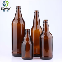 Botol kaca minuman Amber tebal bulat kustom dengan tutup dalam berbagai ukuran botol bir