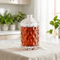 Bouteille en verre de vodka personnalisée avec motif en relief, 700 ml, 750 ml, bouteilles à spiritueux transparentes rondes en verre silex, vente en gros