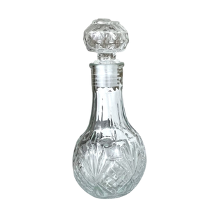 BOTELLA DE VIDRIO TRANSPARENTE DE 100 ML CON TAPA DE VIDRIO - Product Image 1