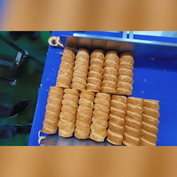 Machine à trancher le pain industrielle réglable, machine à trancher le pain automatique commerciale, équipement de découpe et de tranchage pour pâtisseries et cornets.