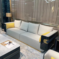 Sofa de meubles de salon de luxe moderne placage de bois massif avec design en métal ensembles de canapés en cuir