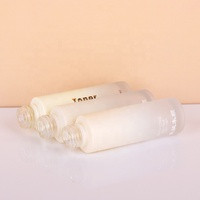 Bouteille ronde en verre de couleur dégradée de 30ml avec bouchon à bille et pompe de traitement réutilisable pour l'emballage de lotion crème pour le visage