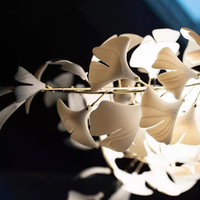 Lustre en cristal de luxe moderne personnalisé pour hôtels Plafonnier suspendu en or avec télécommande Long éclairage d'escalier à LED