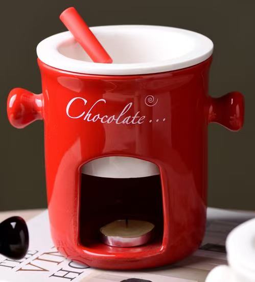 Tasse rouge + fourchette + bougie