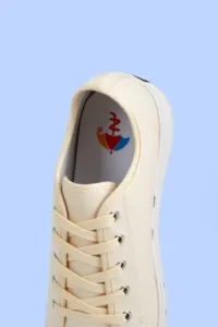 Zapatillas de deporte clásicas de color liso, zapatos de lona blancos de lona personalizados independientemente del género, zapatos vulcanizados NR de algodón EVA