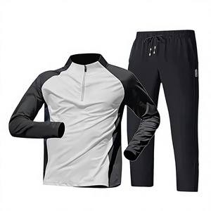 Ensemble de survêtement sportif pour homme avec blocs de couleur, haut à manches longues zippé, pantalon noir, séchage rapide, tissé 100 % polyester, idéal pour l'été - Product Image 1