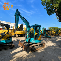 Б/у мини-экскаватор Kubota KX135 в хорошем рабочем состоянии, с ковшом 0,2 м³, грузоподъемность 3,5 тонны, на гусеничном ходу, для работы на мусорных полигонах
