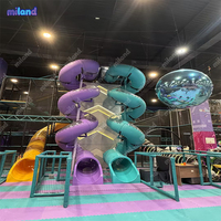 Équipement de parc d'aventure intérieur Thème Astronaute Parcs d'attractions colorés Pont en filet Toboggan fusée Service OEM ODM Premium