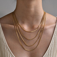 Vente en gros de bijoux de mode simples et imperméables, collier à chaîne en forme de serpent rond fin en acier inoxydable plaqué or et argent pour femmes