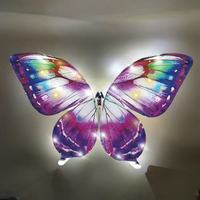 Dron LED elegante de lujo con forma de mariposa, juguete volador recargable al por mayor para bodas, espectáculos, conciertos, efectos escénicos, portador de anillos
