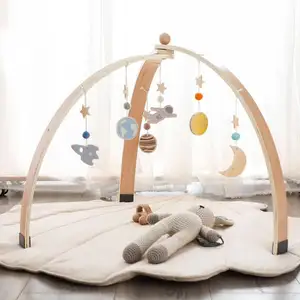 Hadiah bayi baru lahir mainan suspensi Bar gantung pusat aktivitas bingkai Gym lipat bayi bermain kayu untuk eksplorasi sensorik