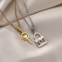 Collier pendentif magnétique double couleur en acier inoxydable pour couple, design créatif, cadeau de la Saint-Valentin