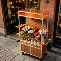 Chariot de présentation mobile pour fleuriste en profilé aluminium avec panneau perforé, tiroir et roulettes