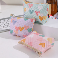 Vente en gros de petites pochettes à fermeture éclair, jolies pochettes matelassées en PU, mini sacs portables pour cosmétiques, sacs à rouge à lèvres pour femmes