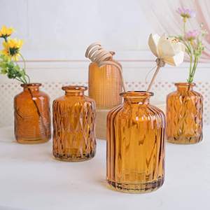 Vente en gros de <span class=keywords><strong>vase</strong></span> à fleurs en verre nordique pour mariage à la maison <span class=keywords><strong>vase</strong></span> en verre bouteille à fleurs ambre décoratif unique et créatif - Product Image 3