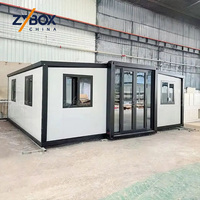 Maison conteneur extensible ignifuge A1 de 20 pieds avec cadre noir, maison préfabriquée avec terrasse, usine source, livraison en 10 jours, prête à être expédiée, ADU