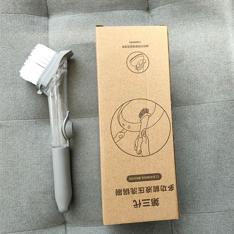 Una olla de lavado hidráulica de mango largo.