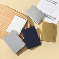 Porte-passeport en cuir PU en stock, étui de protection de voyage tendance avec logo personnalisé