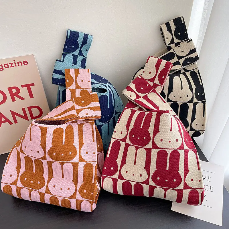 Tragbares Kaninchenmuster gestrickt gehäkelt Damenhandtaschen 2024 neues Design kundenspezifische handgewebte Handgelenktüte