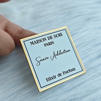 Autocollants d'étiquettes adhésives imperméables personnalisés de haute qualité avec procédé de gaufrage pour l'emballage de flacons de parfum et de boîtes cadeaux